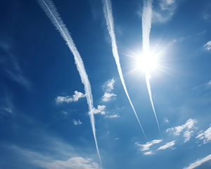 Airplane chemtrails vertical in the air upwards realistic